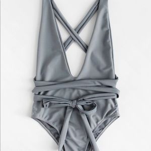 Multi-way one piece bathing suit.